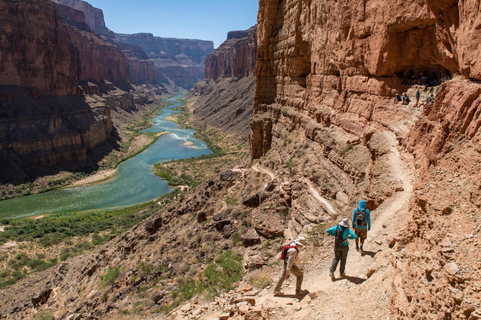 Hikers on their way to the Nankoweap granaries above the Colorado River in Grand Canyon