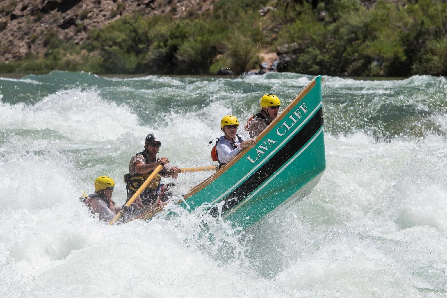 A dory goes through Lava Falls during a Grand Canyon dories trip between Pipe Creek and Whitmore Wash.