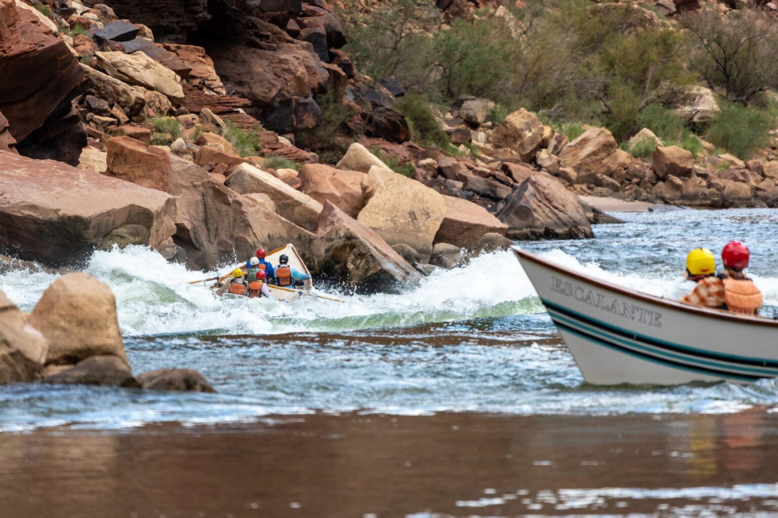 A pair of dories approach one of the rapids in the Upper Grand Canyon.
