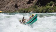 A dory runs Lava Falls rapid on the Colorado River through Grand Canyon during an OARS trip.