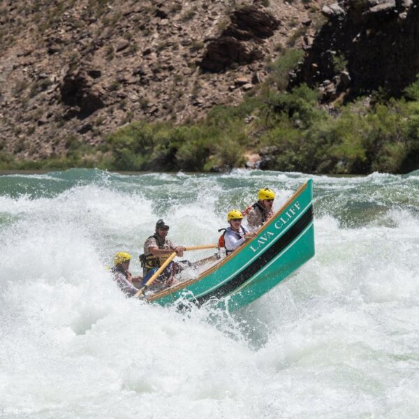 A dory runs Lava Falls rapid on the Colorado River through Grand Canyon during an OARS trip.