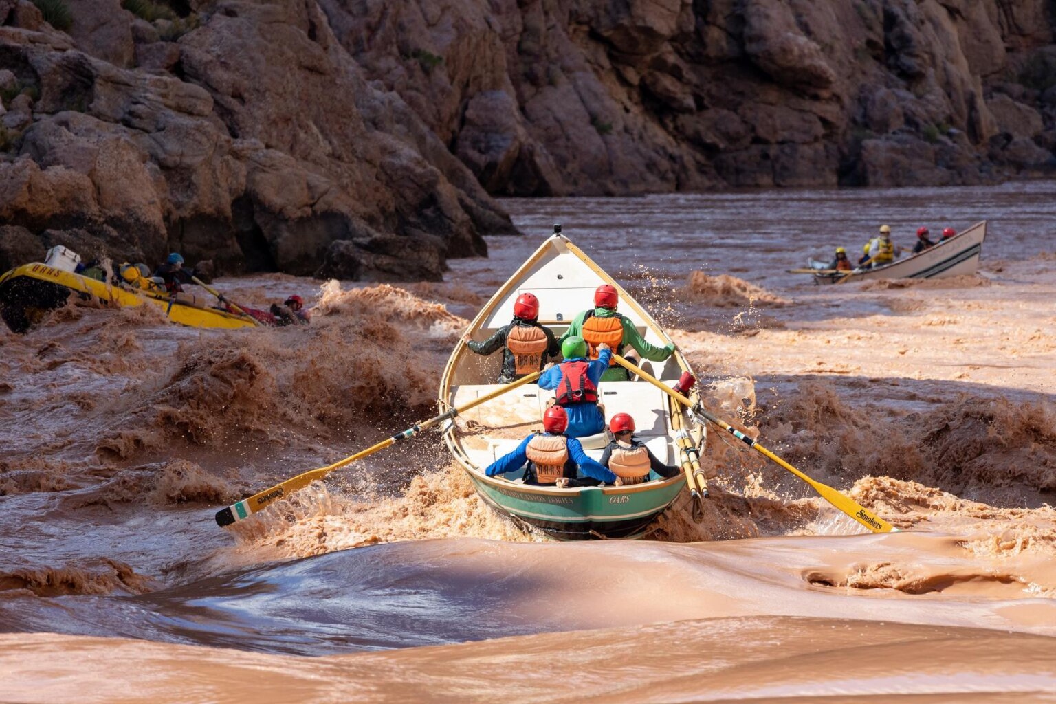 A dory runs a rapid on the Colorado River