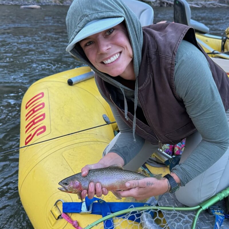 A woman holds a cutthroat trout on the Middle Fork of the Salmon River in Idaho