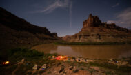 Campsiste along the Colorado River in Cataract Canayon at night