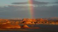 A rainbow shows over Lake Powell