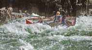 Martin Litton rowing a dory in the Grand Canyon