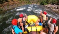 A group of paddlers in a yellow raft on the Chili Bar section of the South Fork American River in California