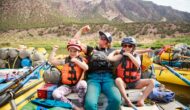A family on a raft in Flaming Gorge.