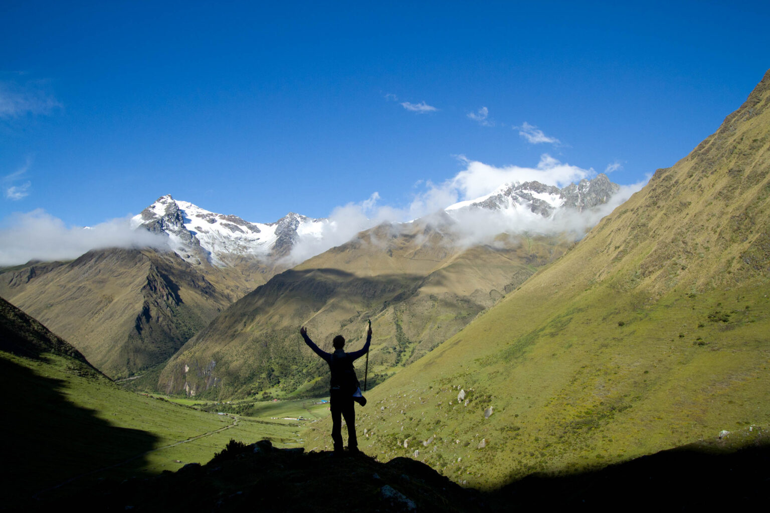 Silhouette of a person on top of a mountain in Peru.