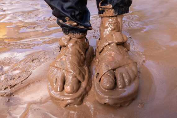 Muddy feet near the Colorado River in Grand Canyon