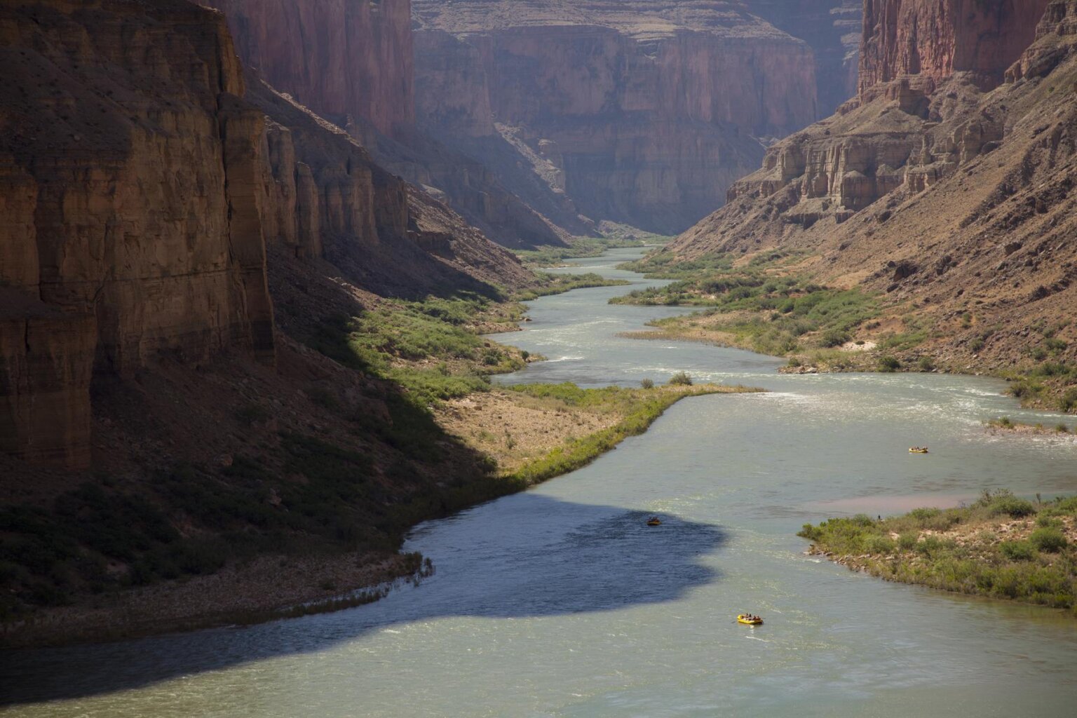 Rafts below the Nankoweap lookout in Grand Canyon