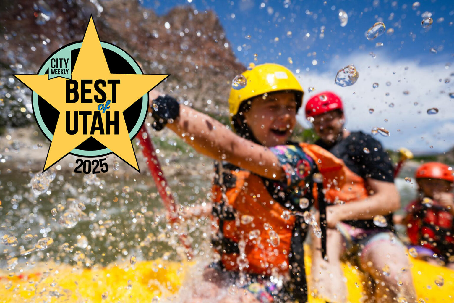 A young girl is splashed during a rafting trip with OARS in Split Mountain Canyon near Dinosaur National Monument.