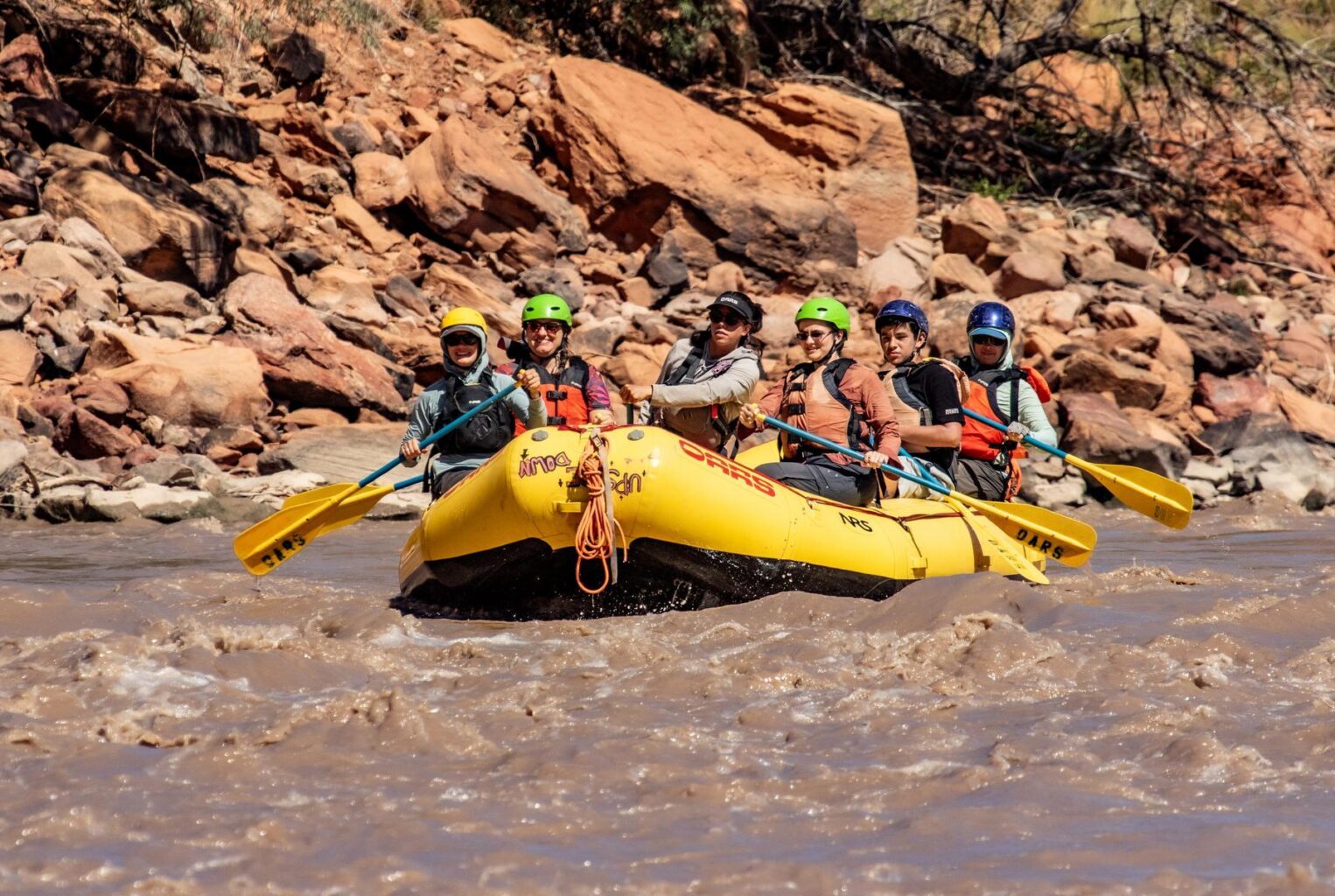 A group of rafters from non-profit First Descents takes on the rapids of the Moab daily stretch. | Photo: Dean Ferguson